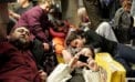 Crowd of people stuck in airport How to survive your vacation flight